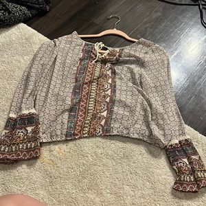 This is long sleeve blouse perfect for the winter time, never worn